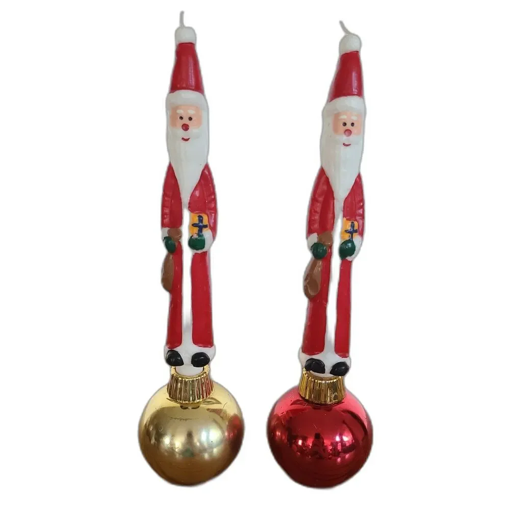 Two Vintage Santa Claus Character Candles In Christmas Ornament Candle Holders
